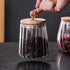 1Chase Borosilicate Glass Storage Jar With Airtight Bamboo Lid and Metal Handle Taper Shape 600 ML